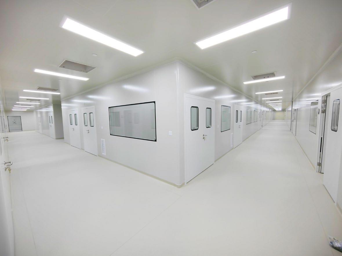 Turnkey cleanroom corridor with double-glazed flush windows and airtight doors